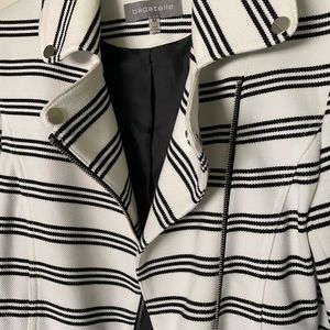 Black and white striped jacket.